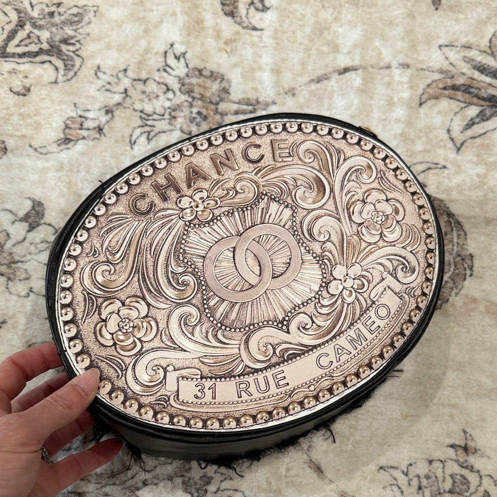 Elegant Oval Embossed Clutch
